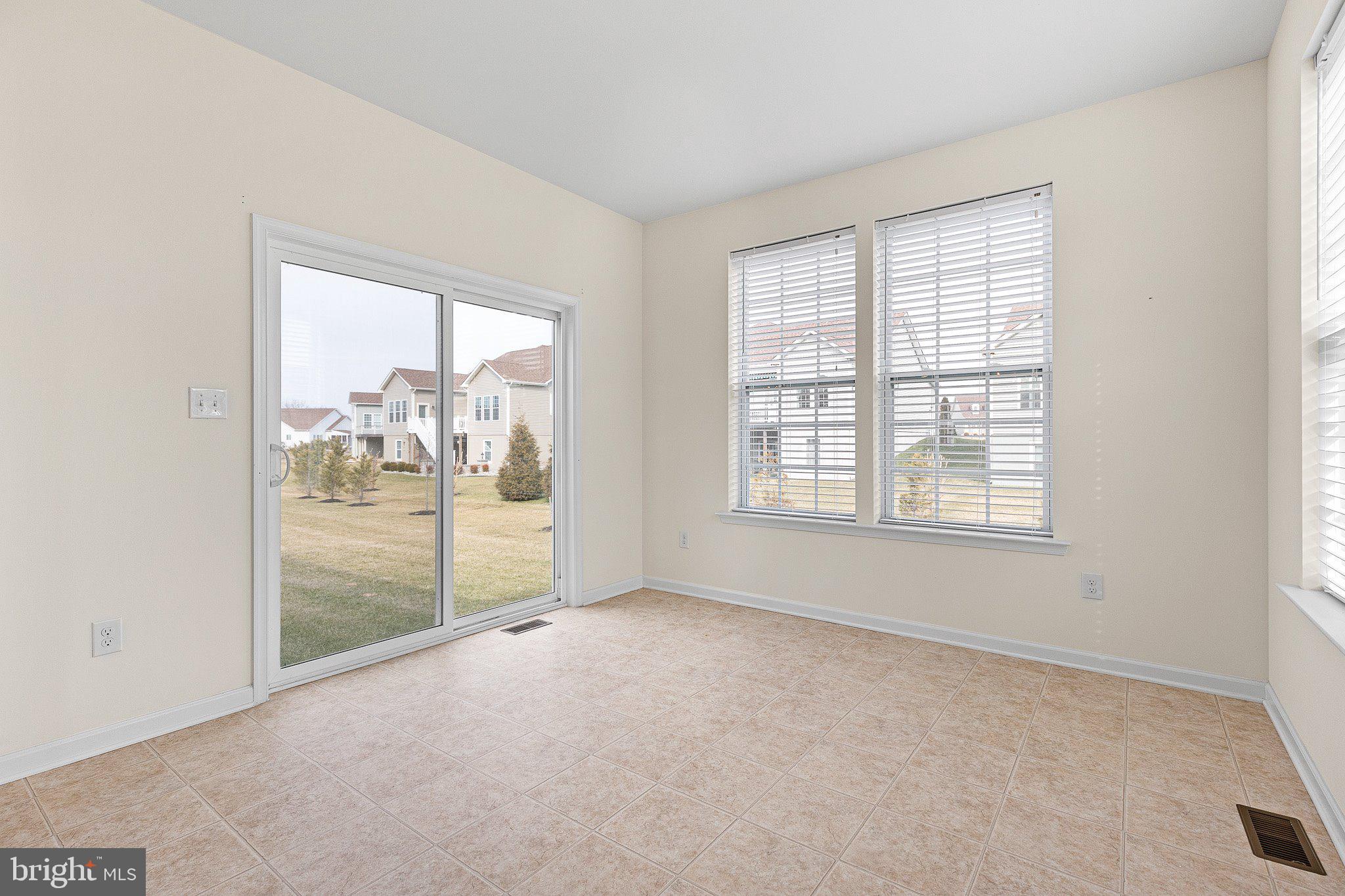 647 Vivaldi Drive Middletown, DE 19709 - Photo 17 of 38 a view of an empty room with a window