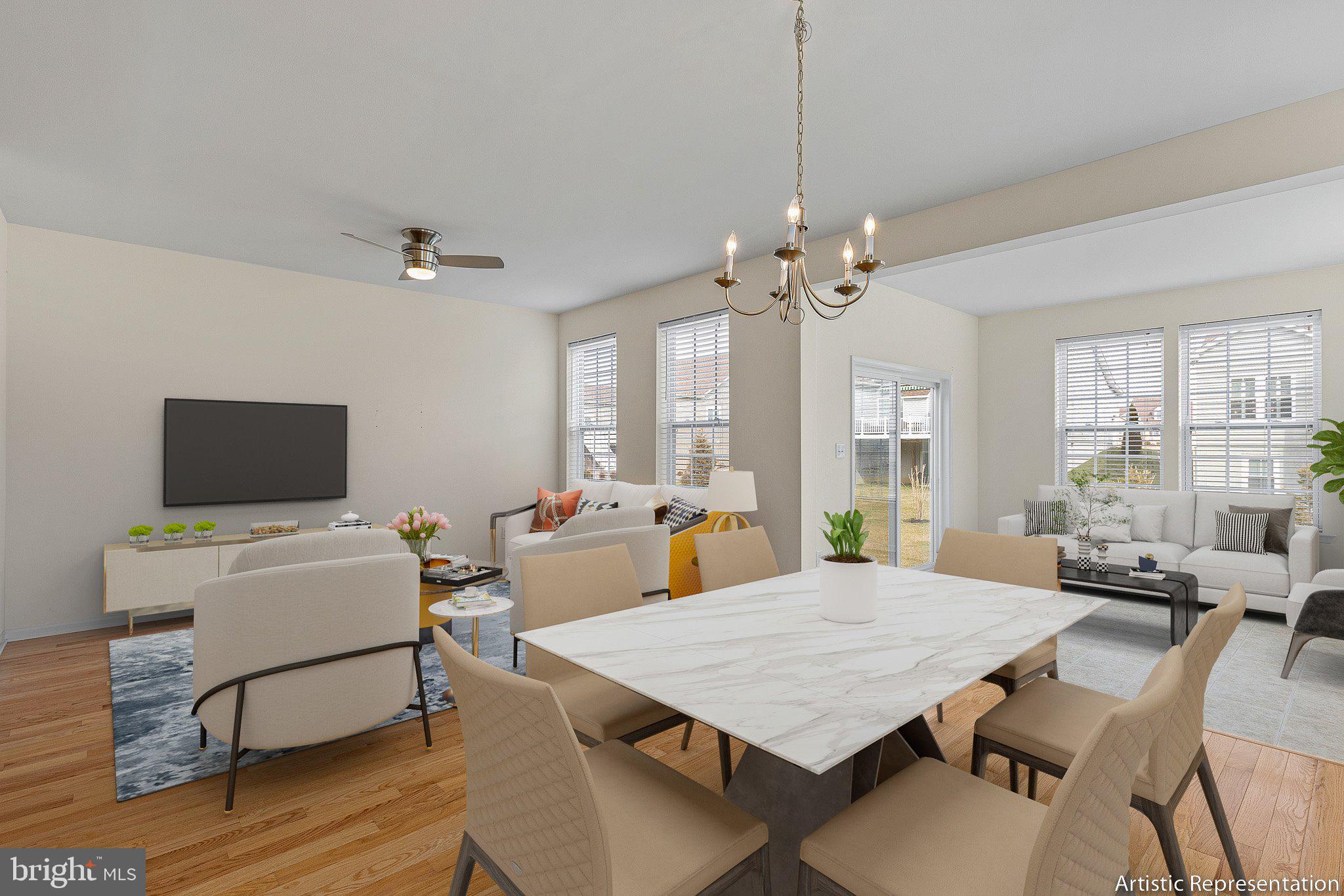 647 Vivaldi Drive Middletown, DE 19709 - Photo 2 of 38 a view of a dining room with furniture window and wooden floor