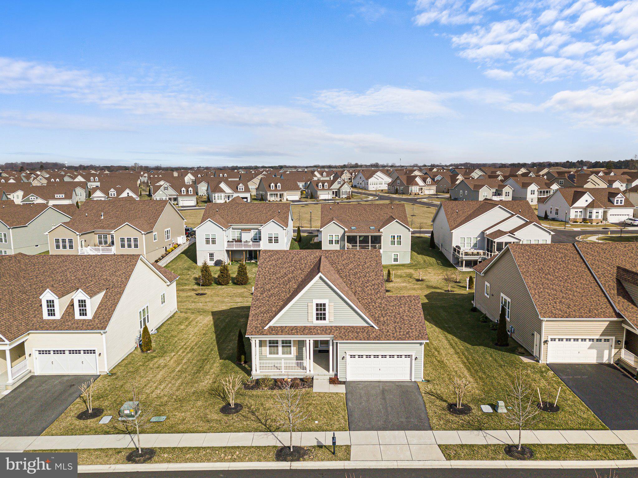 647 Vivaldi Drive Middletown, DE 19709 - Photo 30 of 38 an aerial view of a residential apartment building with a yard