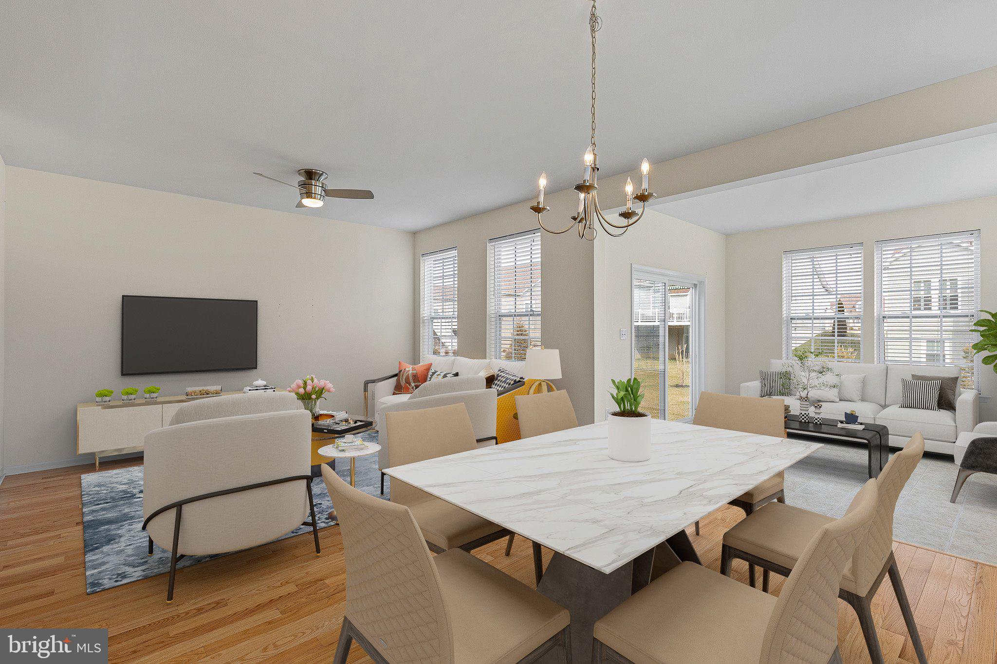 647 Vivaldi Drive Middletown, DE 19709 - Photo 38 of 38 a view of a dining room with furniture window and wooden floor