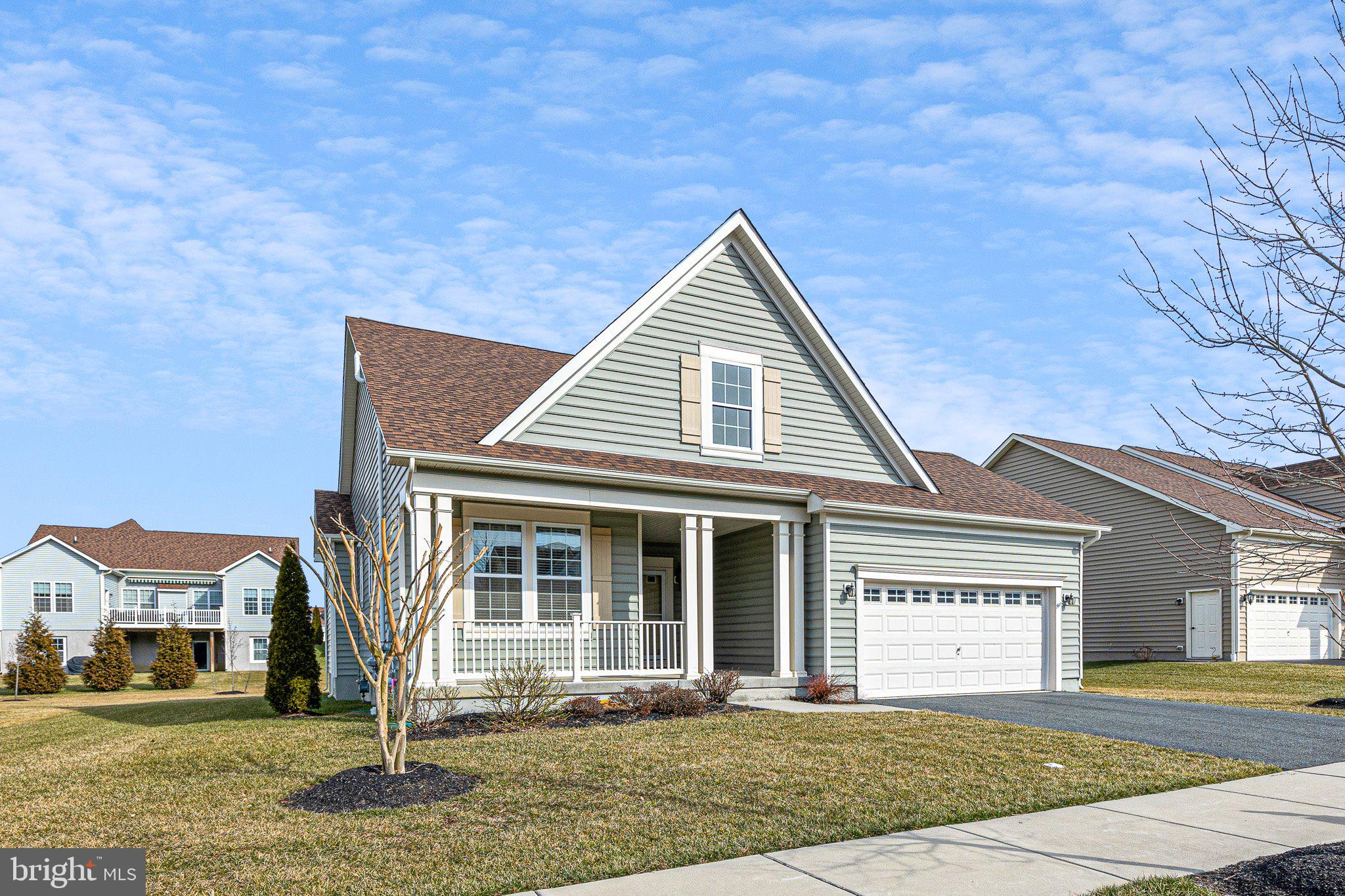 647 Vivaldi Drive Middletown, DE 19709 - Photo 5 of 38 a front view of a house with a yard