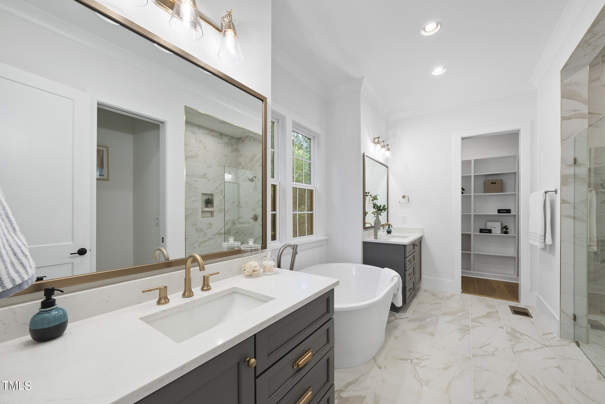 13541 Old Creedmoor Road Wake Forest, NC 27587 - Photo 13 of 41 a bathroom with a sink double vanity and a mirror