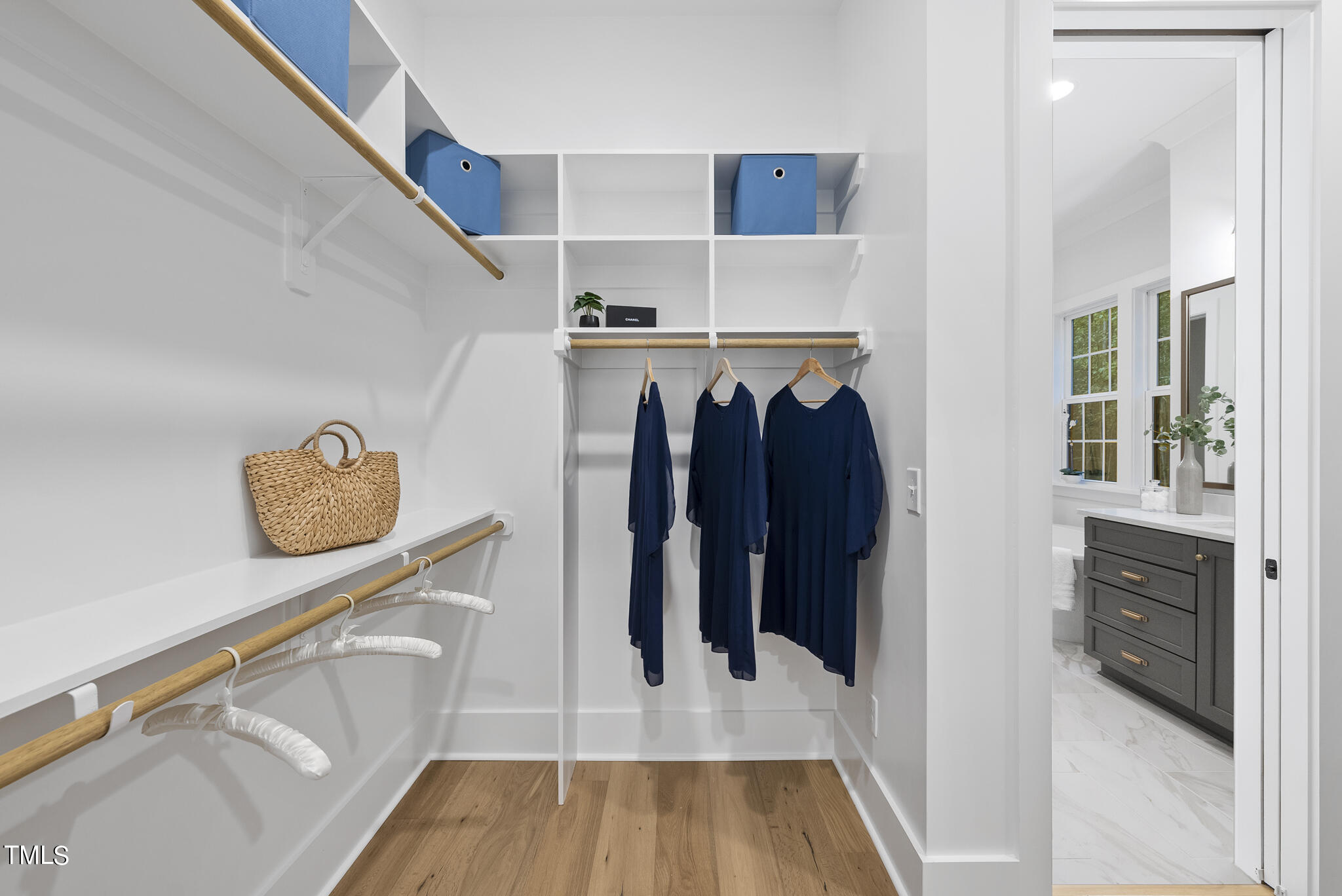 13541 Old Creedmoor Road Wake Forest, NC 27587 - Photo 16 of 41 a view of walk in closet with clothes and shoes