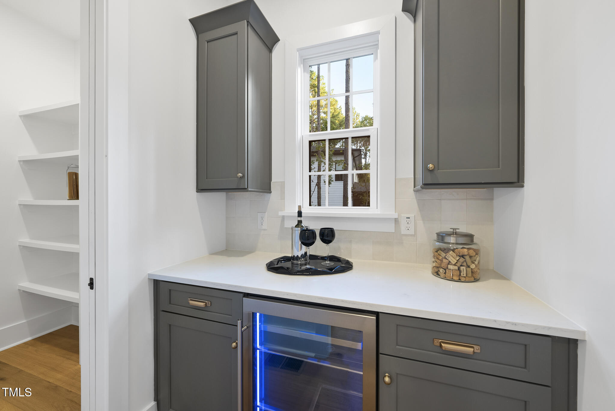 13541 Old Creedmoor Road Wake Forest, NC 27587 - Photo 28 of 41 a kitchen with a sink and cabinets