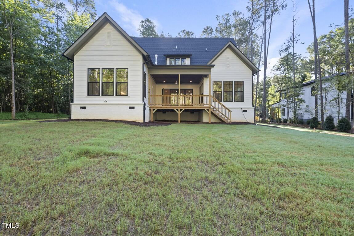 13541 Old Creedmoor Road Wake Forest, NC 27587 - Photo 37 of 41 a view of a house with a yard