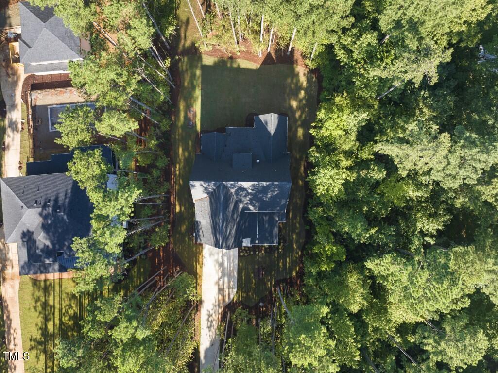 13541 Old Creedmoor Road Wake Forest, NC 27587 - Photo 38 of 41 an aerial view of a house with a yard