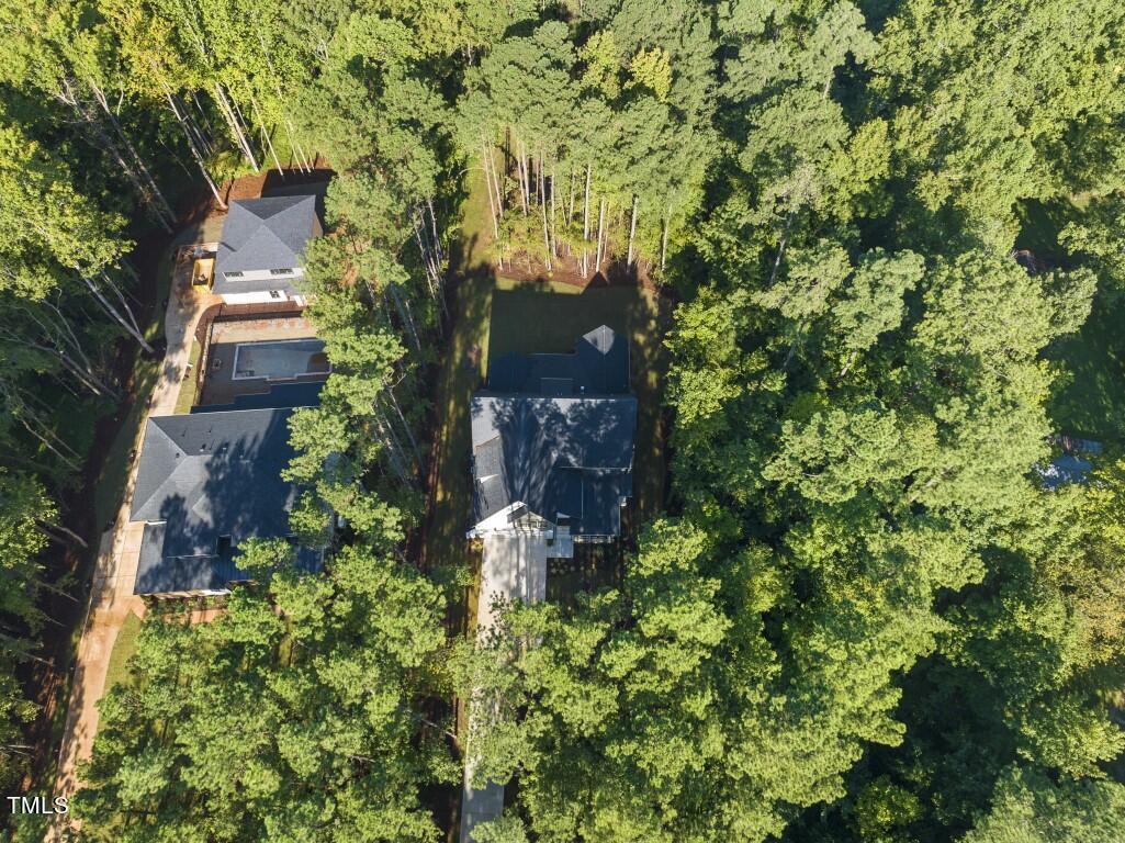 13541 Old Creedmoor Road Wake Forest, NC 27587 - Photo 39 of 41 an aerial view of a house with a yard