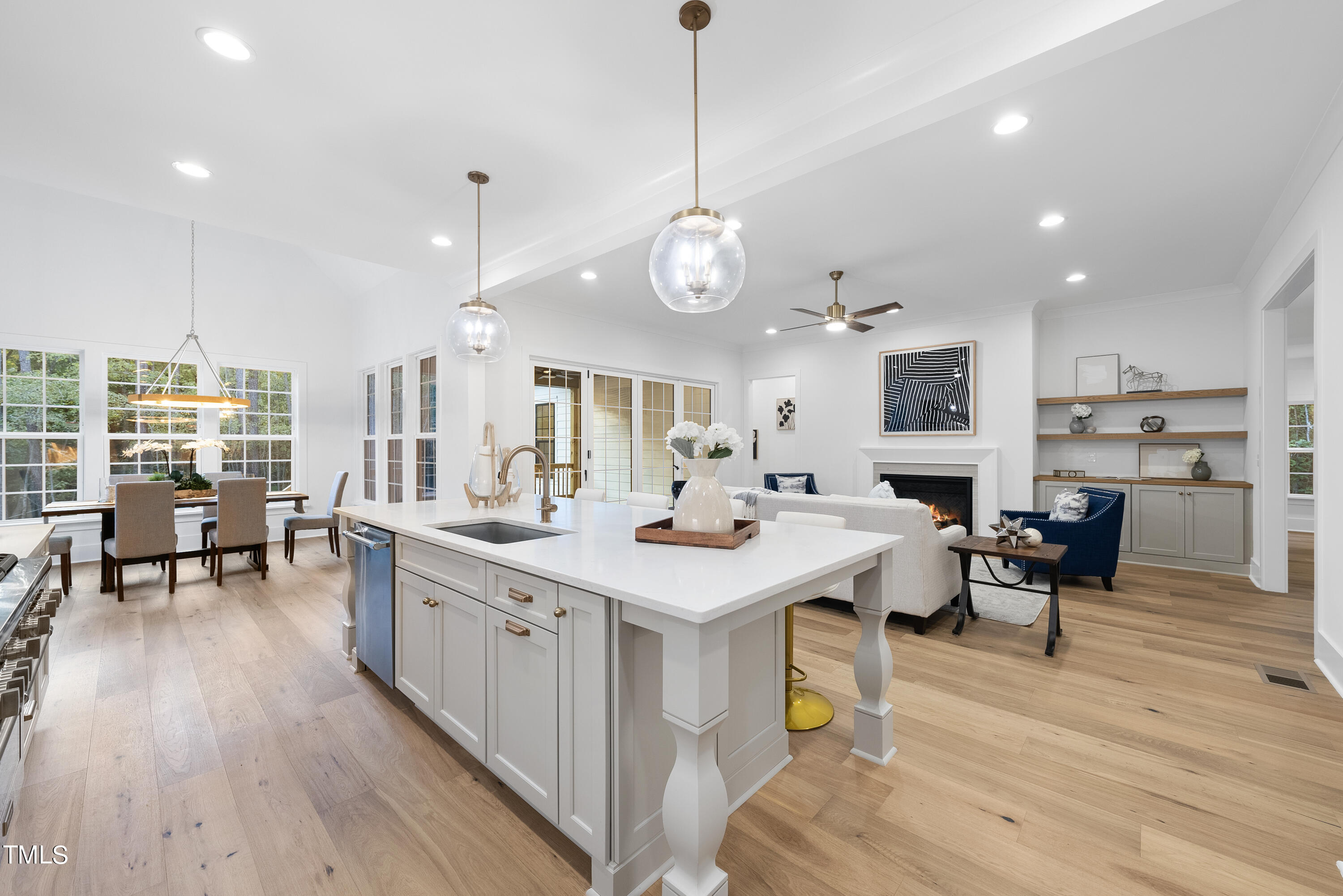 13541 Old Creedmoor Road Wake Forest, NC 27587 - Photo 6 of 41 a large kitchen with a table and chairs
