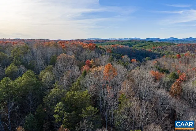 a view of a city with mountains in the background