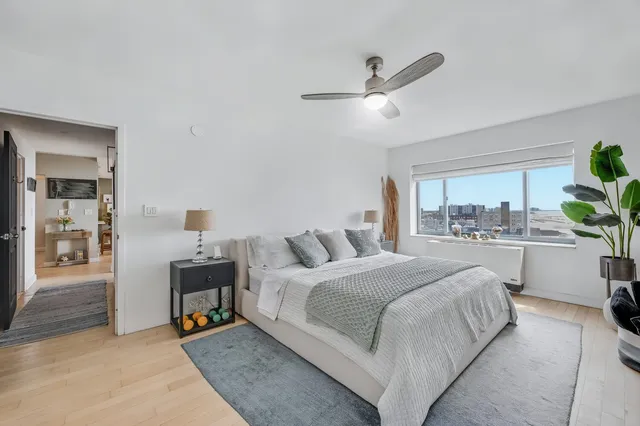 a bathroom with a sink a mirror and shower