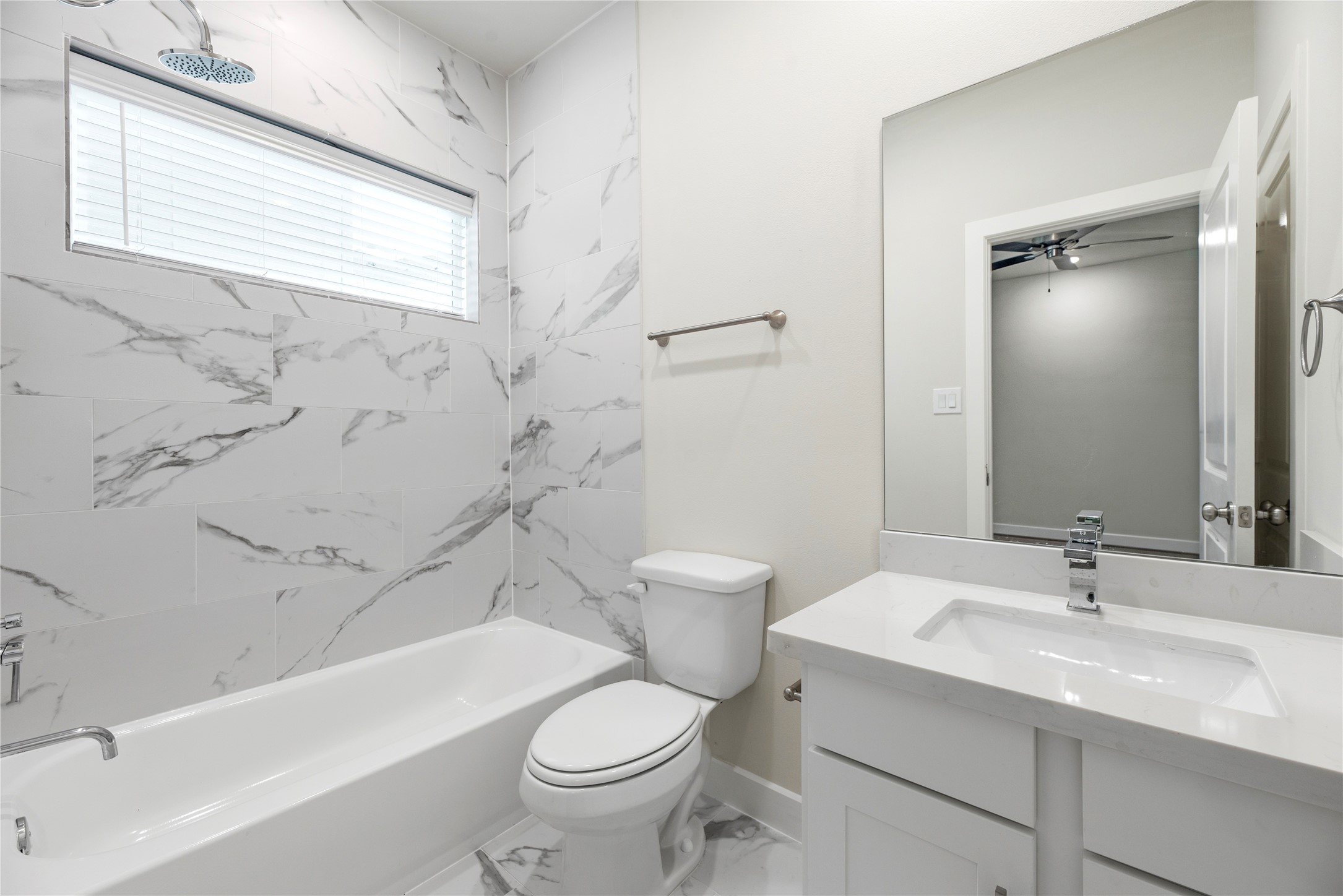3075 Hicks Street Houston, TX 77007 - Photo 6 of 34 a bathroom with a sink toilet and shower