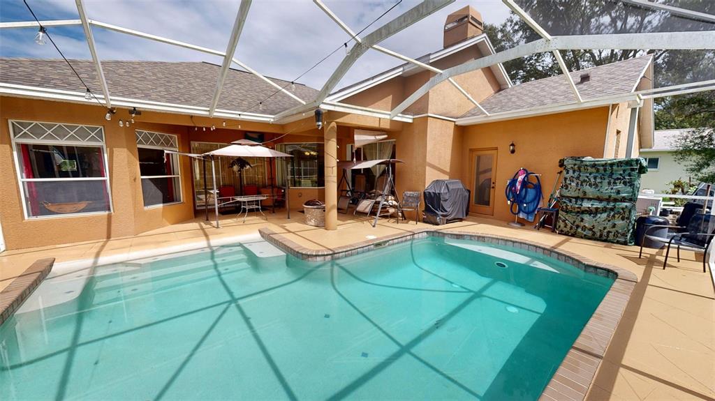 3362 Cedar Crest Loop Spring Hill, FL 34609 - Photo 33 of 57 a view of a gym with a patio