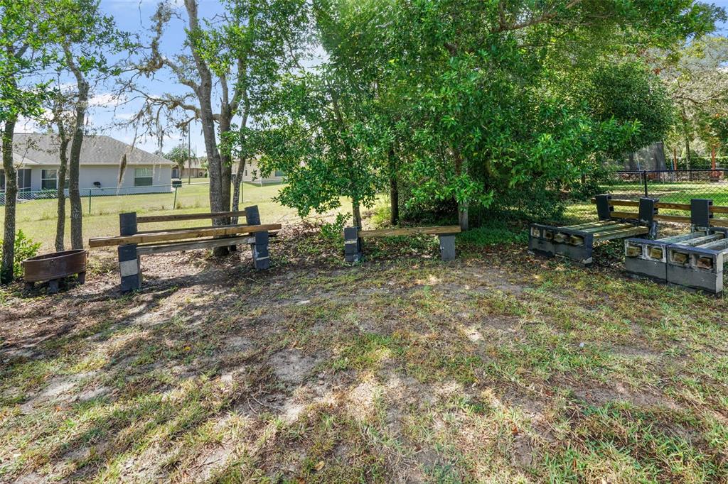3362 Cedar Crest Loop Spring Hill, FL 34609 - Photo 38 of 57 a view of a park with large trees