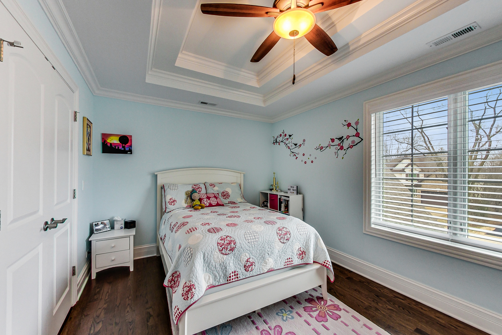 1049 Greentree Avenue Deerfield, IL 60015 - Photo 20 of 37 a bedroom with a bed and a chandelier