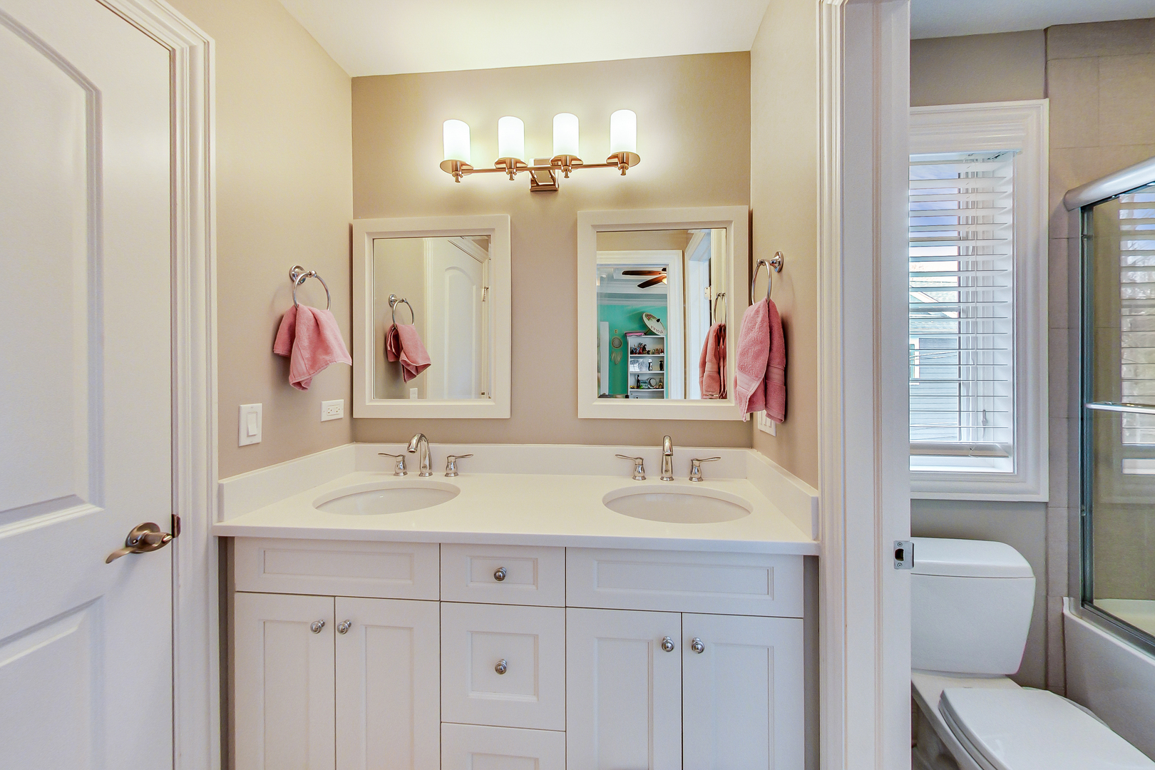 1049 Greentree Avenue Deerfield, IL 60015 - Photo 24 of 37 a bathroom with a sink and a mirror