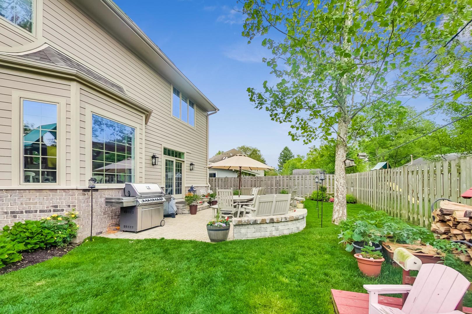 1049 Greentree Avenue Deerfield, IL 60015 - Photo 37 of 37 a view of a house with a backyard and a patio