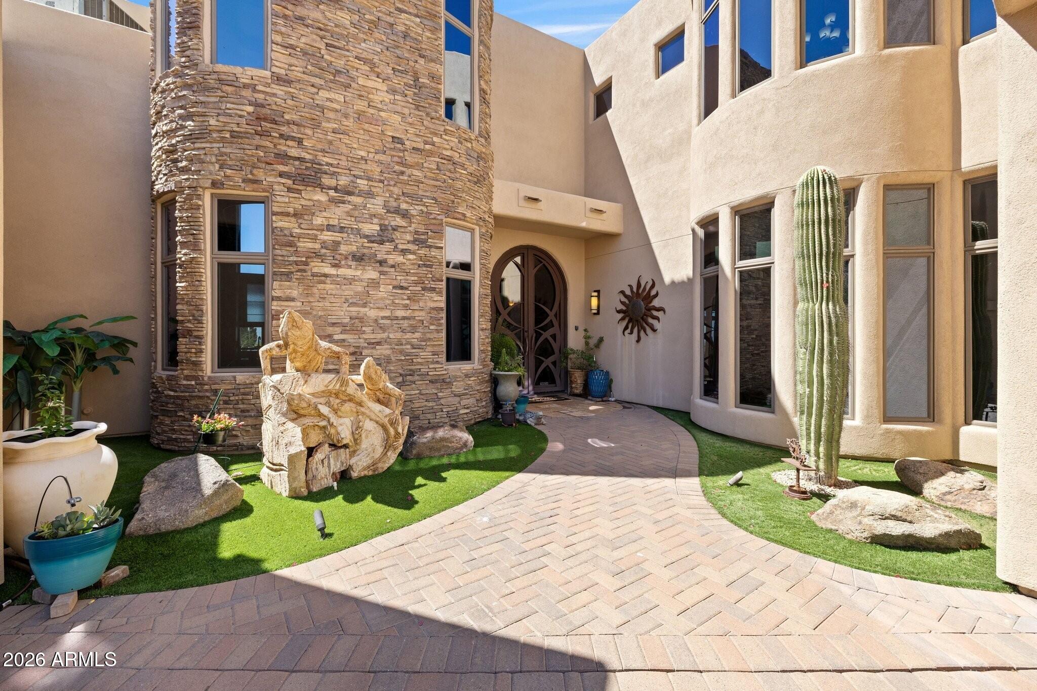 8540 East McDowell Road, Unit 21 Mesa, AZ 85207 - Photo 22 of 121 Entry with Sculpture Garden