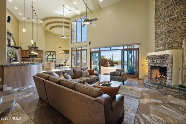 a view of balcony with furniture and city view