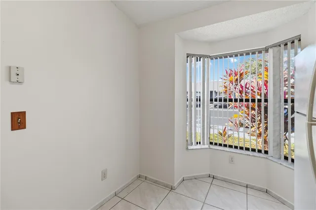 a view of a bathroom with a toilet and a shower