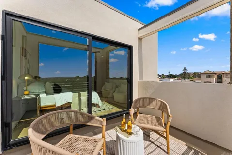 a view of balcony with furniture