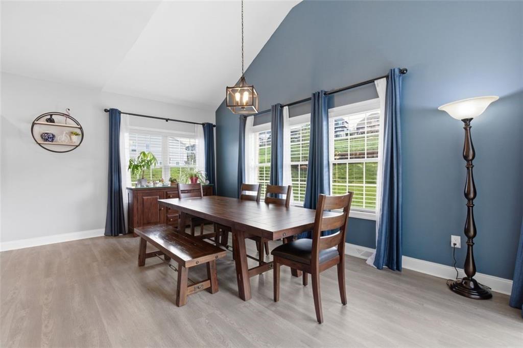 359 Juniper Way Canonsburg, PA 15317 - Photo 16 of 42 a view of a dining room with furniture window and wooden floor