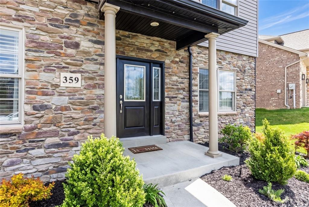 359 Juniper Way Canonsburg, PA 15317 - Photo 2 of 42 a view of yellow house with a yard
