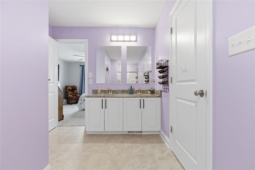 359 Juniper Way Canonsburg, PA 15317 - Photo 26 of 42 a bathroom with a sink and a mirror