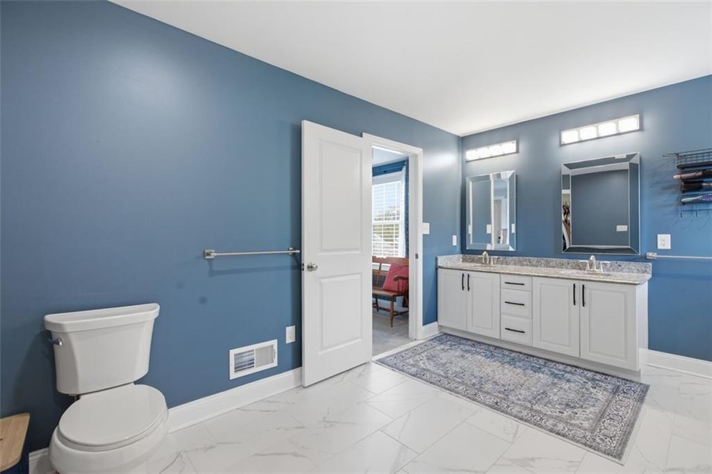 359 Juniper Way Canonsburg, PA 15317 - Photo 31 of 42 a bathroom with a toilet sink and mirror