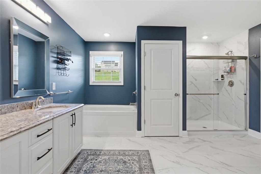 359 Juniper Way Canonsburg, PA 15317 - Photo 32 of 42 a bathroom with a granite countertop sink a toilet and shower
