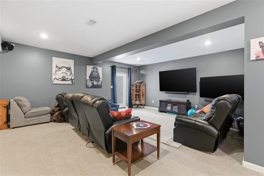 359 Juniper Way Canonsburg, PA 15317 - Photo 35 of 42 a living room with furniture and a flat screen tv