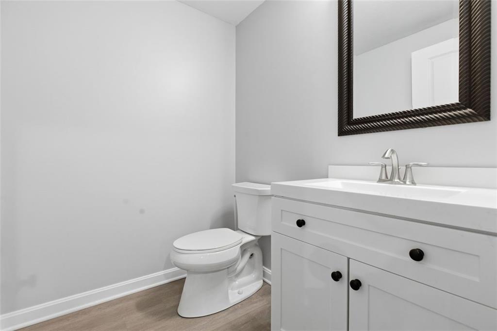 359 Juniper Way Canonsburg, PA 15317 - Photo 38 of 42 a bathroom with a sink mirror and toilet
