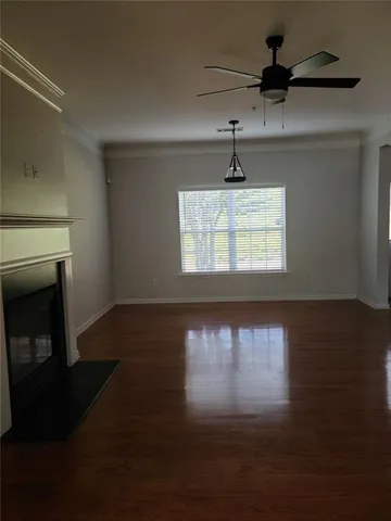 a view of staircase with white walls