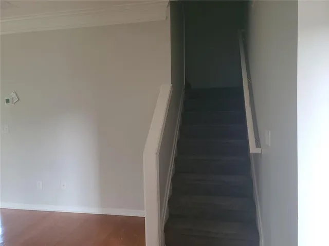 a view of entryway with wooden floor