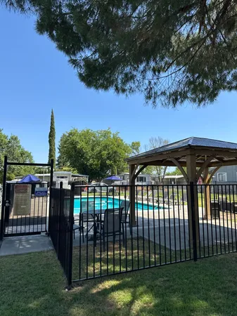 a view of backyard with green space