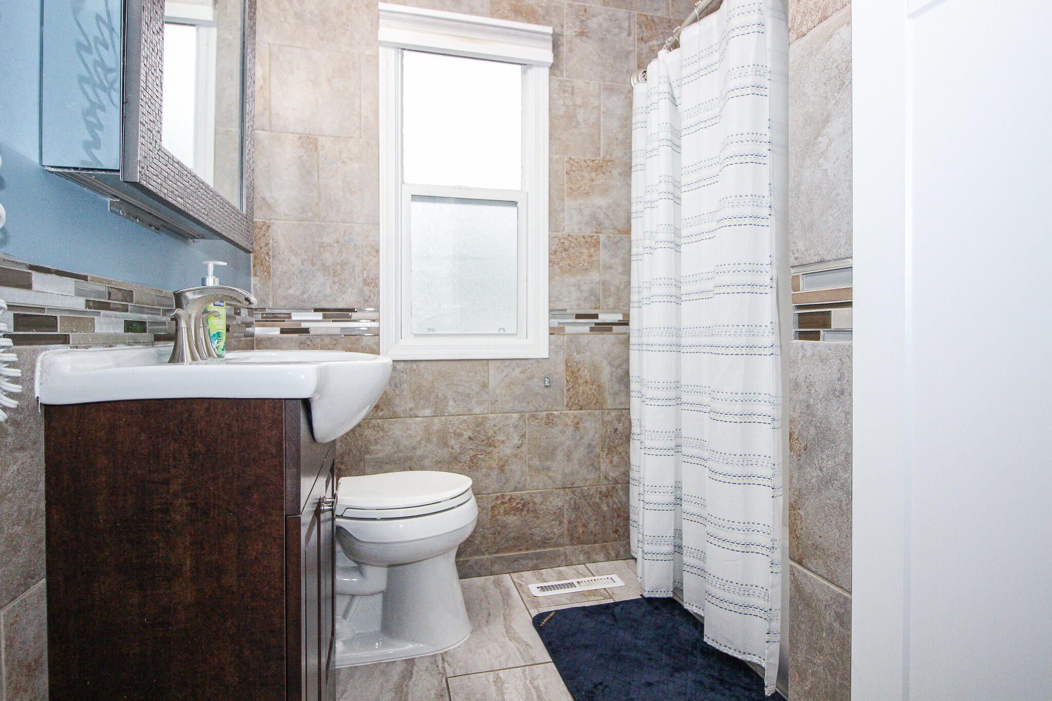 522 Dexter Drive Crown Point, IN 46307 - Photo 13 of 21 a bathroom with a sink a toilet and shower