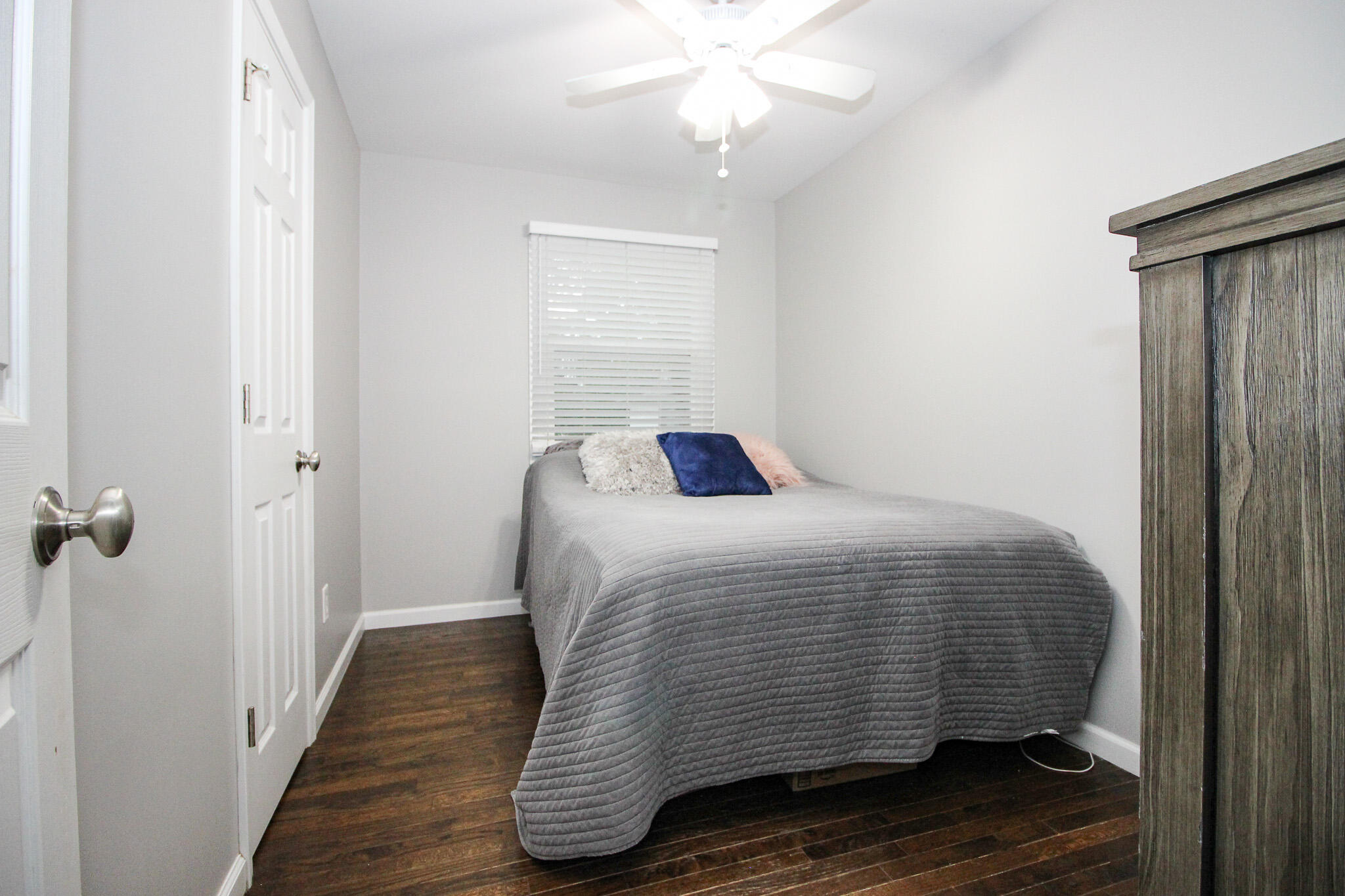 522 Dexter Drive Crown Point, IN 46307 - Photo 14 of 21 a bedroom with a bed and wooden floor