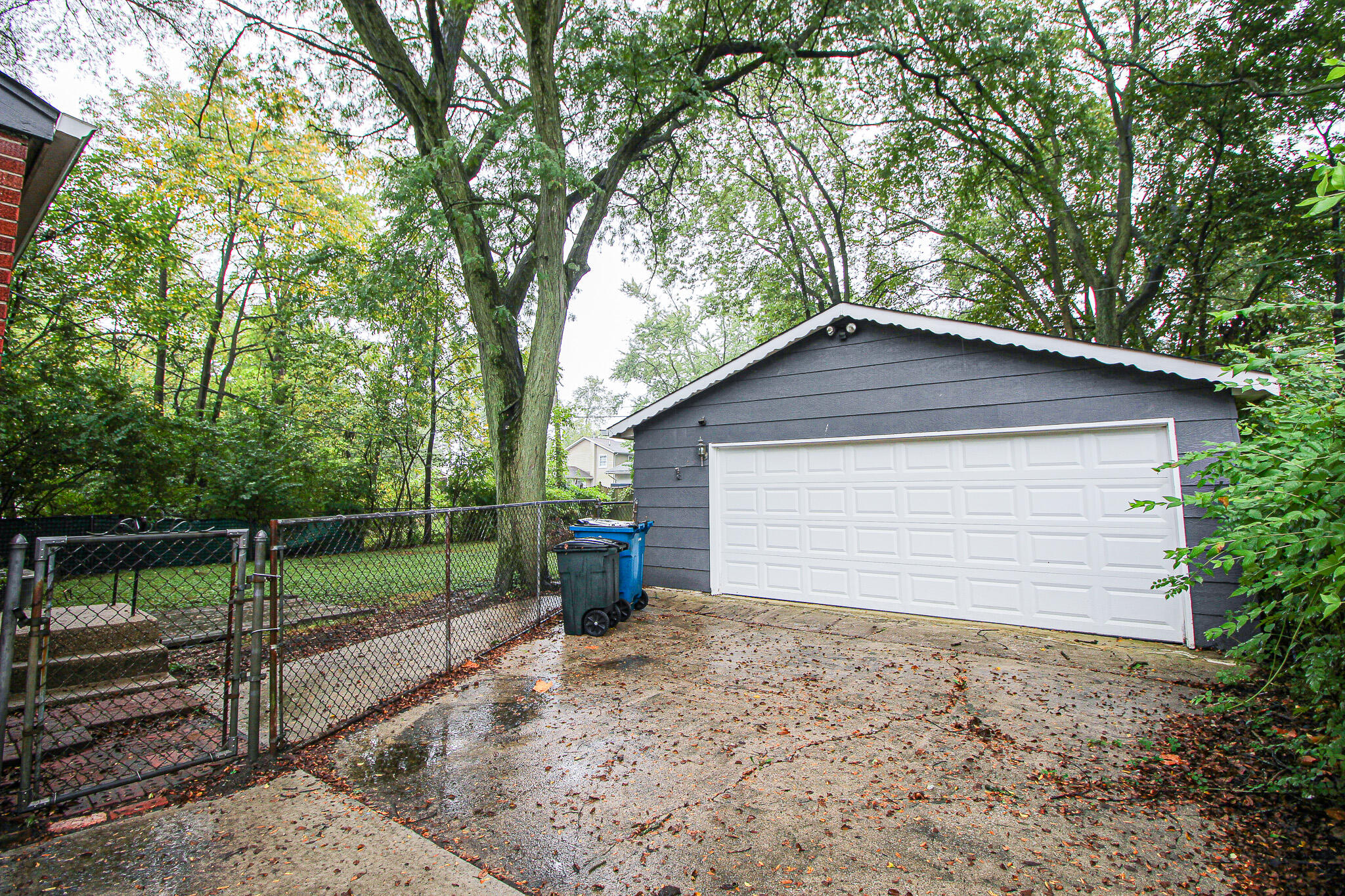 522 Dexter Drive Crown Point, IN 46307 - Photo 16 of 21 a backyard of a house with lots of green space
