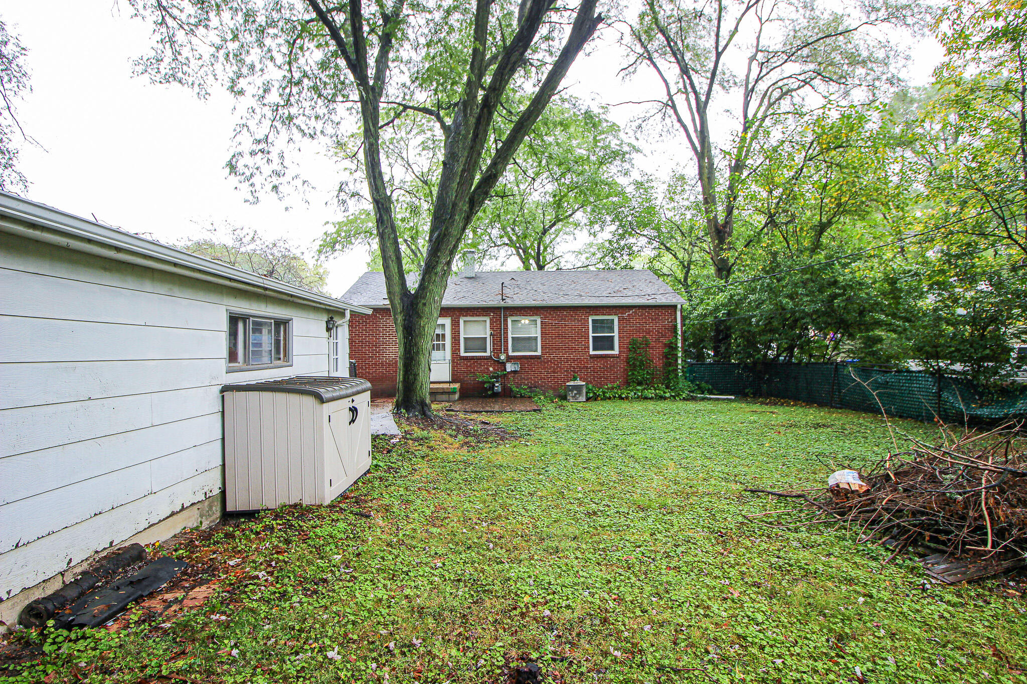 522 Dexter Drive Crown Point, IN 46307 - Photo 19 of 21 a front view of a house with a garden and yard