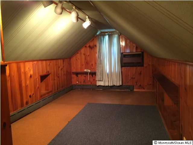 16 Clayton Road Howell, NJ 07731 - Photo 8 of 12 a view of a room with wooden floor and windows