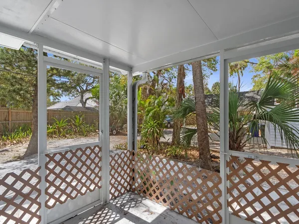 a view of a lake with sitting area