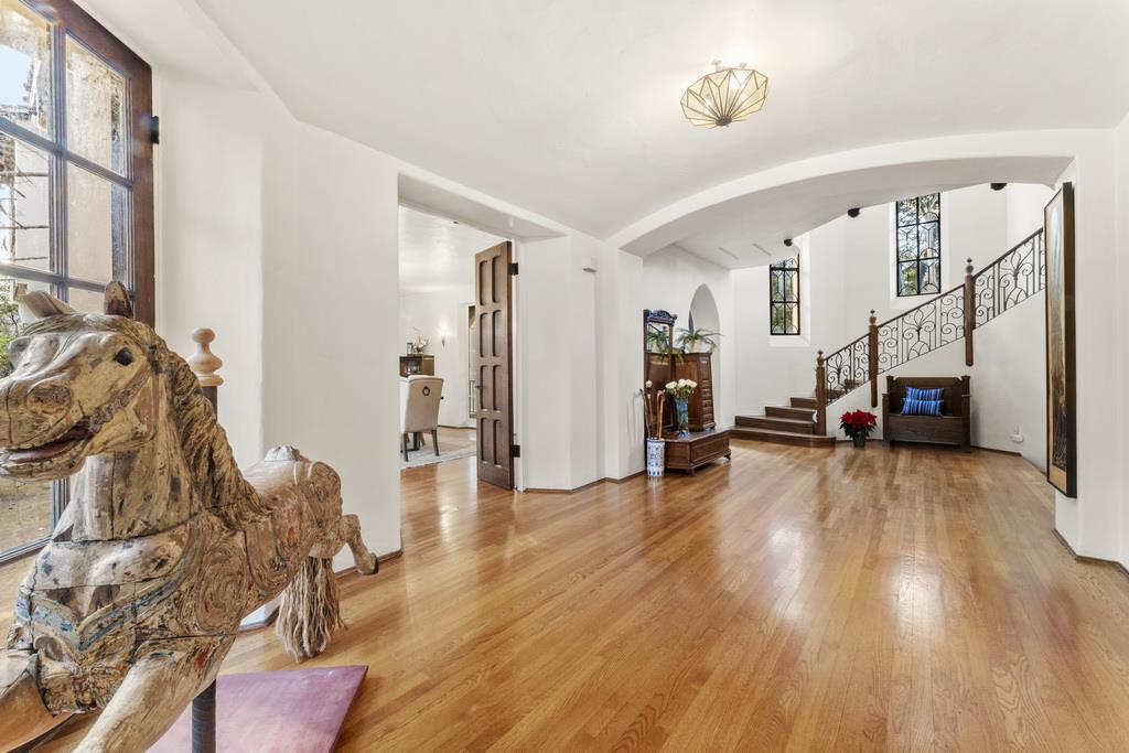 440 Gerona Road Stanford, CA 94305 - Photo 12 of 78 a view of a livingroom with wooden floor and furniture