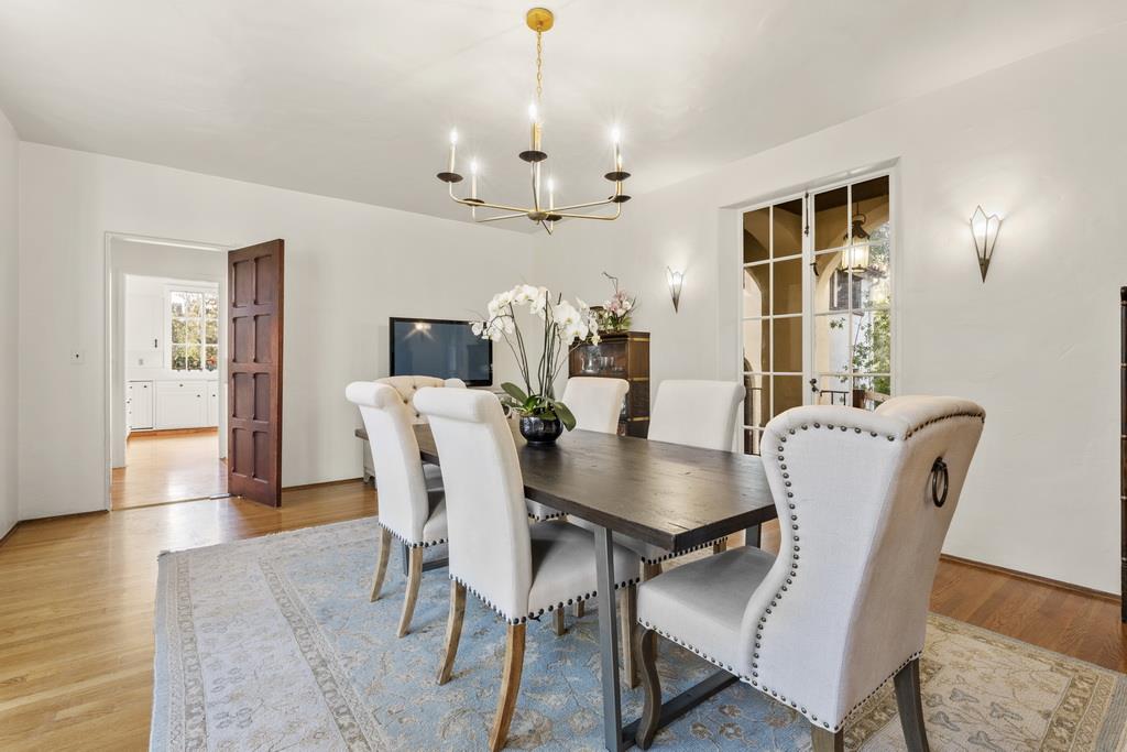 440 Gerona Road Stanford, CA 94305 - Photo 24 of 78 a view of a dining room with furniture window and wooden floor
