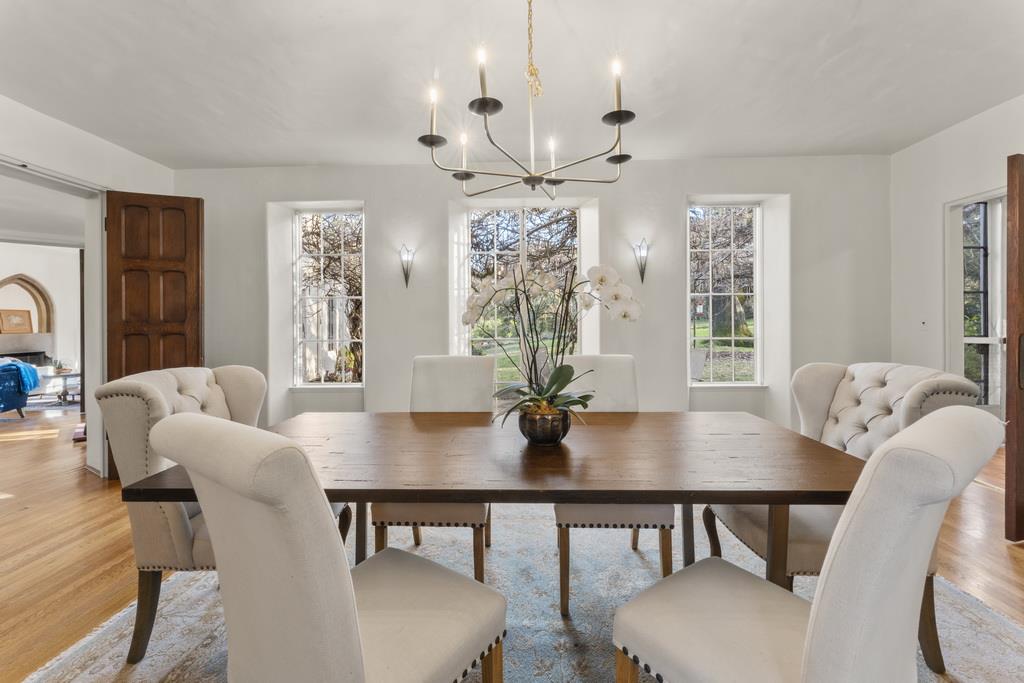 440 Gerona Road Stanford, CA 94305 - Photo 25 of 78 a view of a dining room with furniture window and wooden floor