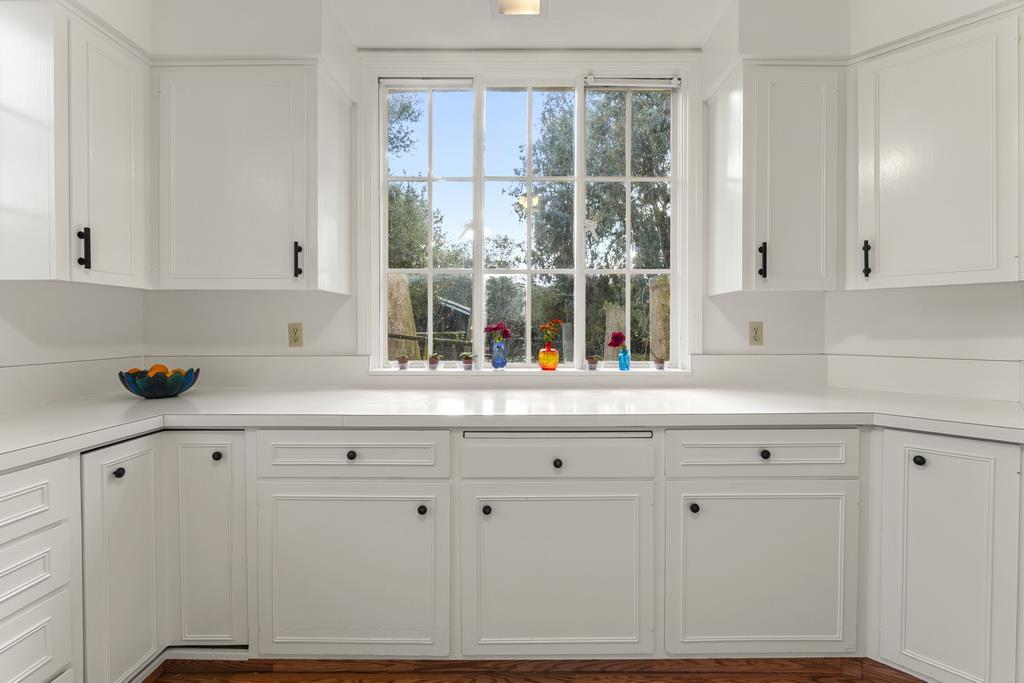 440 Gerona Road Stanford, CA 94305 - Photo 29 of 78 a kitchen with granite countertop white cabinets and sink