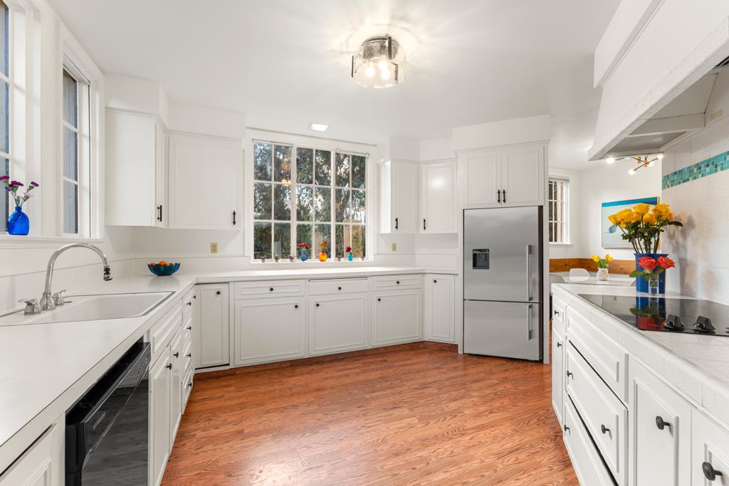 440 Gerona Road Stanford, CA 94305 - Photo 31 of 78 a kitchen with a refrigerator and a sink