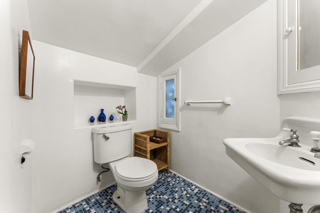 440 Gerona Road Stanford, CA 94305 - Photo 35 of 78 a bathroom with a sink toilet and a mirror