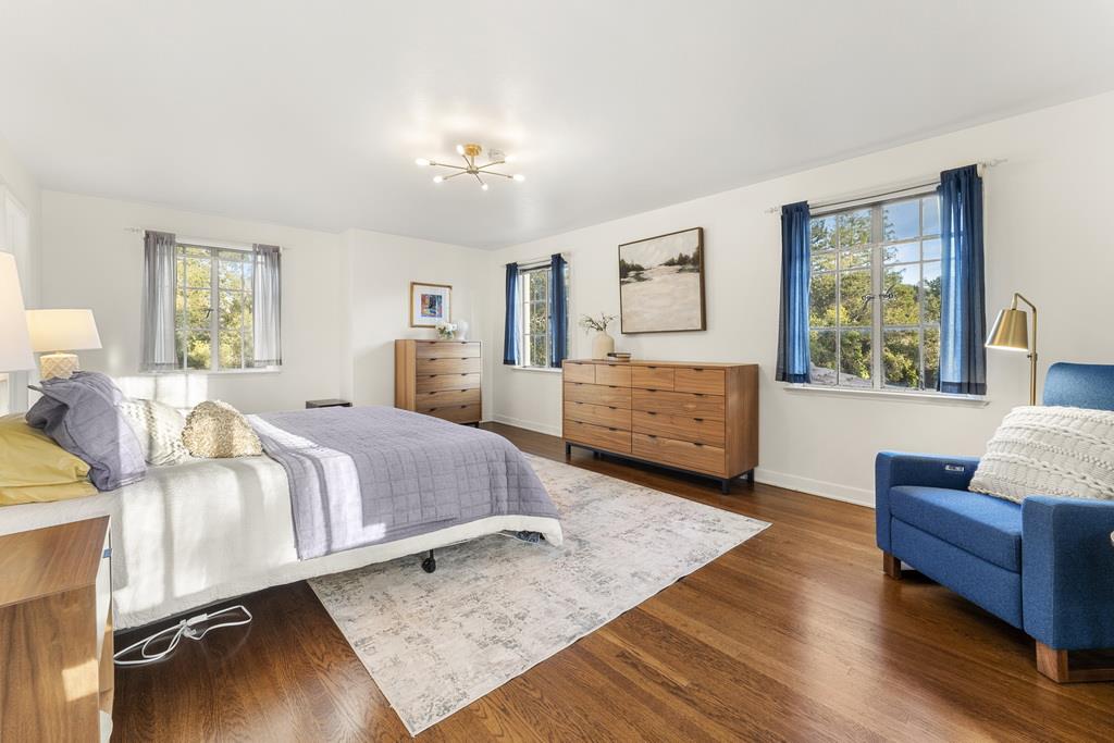 440 Gerona Road Stanford, CA 94305 - Photo 44 of 78 a bedroom with a bed and wooden floor