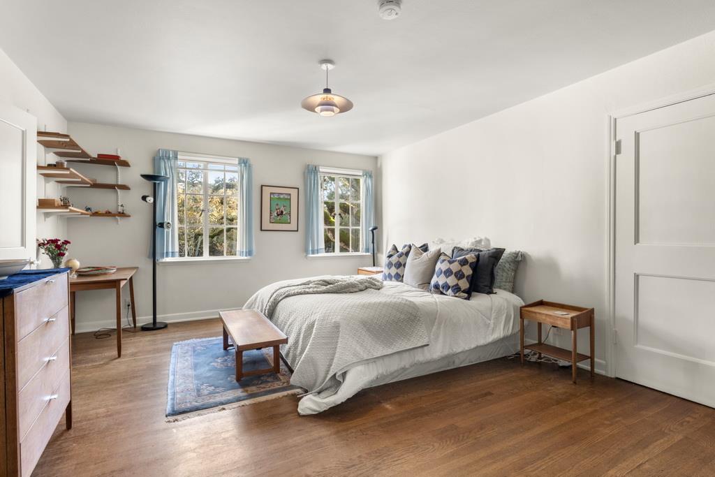 440 Gerona Road Stanford, CA 94305 - Photo 49 of 78 a bedroom with a bed and wooden floor