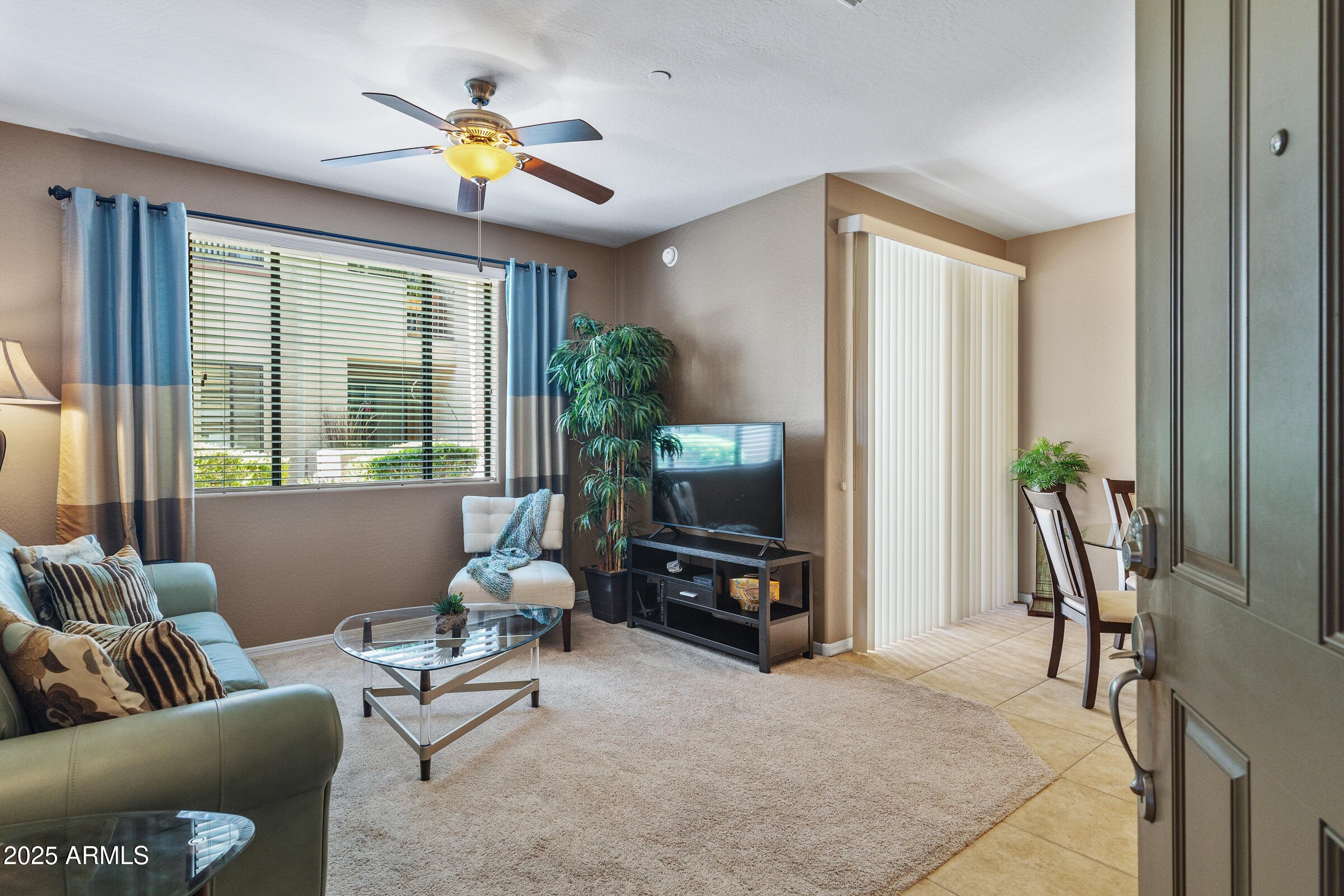 3330 South Gilbert Road, Unit 1013 Chandler, AZ 85286 - Photo 5 of 38 a living room with furniture flowerpot and a window