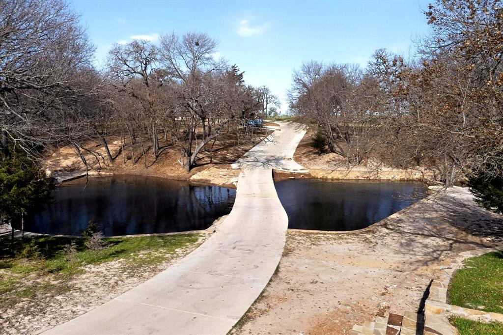3095 Carter Road Springtown, TX 76082 - Photo 21 of 27 a view of a backyard